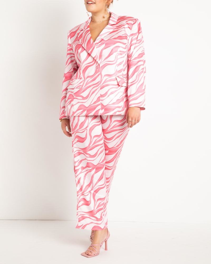 Front of a model wearing a size 20 Zebra Print Trousers in Tiger Crush by ELOQUII. | dia_product_style_image_id:270996
